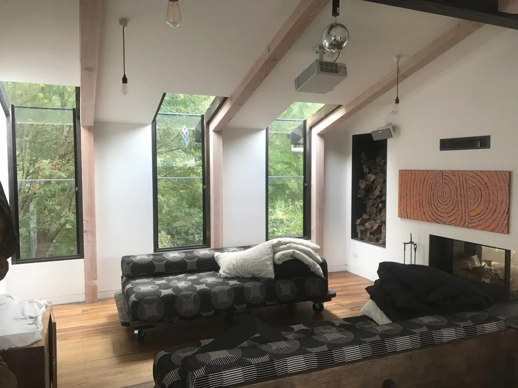 Living room, raked ceiling and beams