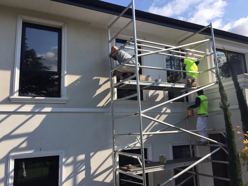 Scaffolded two-storey repaint