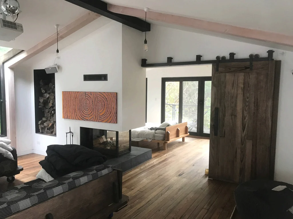 Open living with a timber barn door
