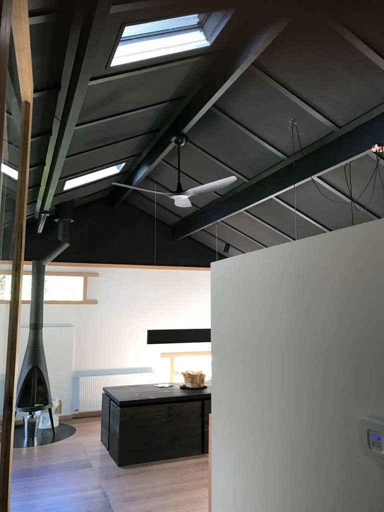 Dark ceiling, white walls and fireplace